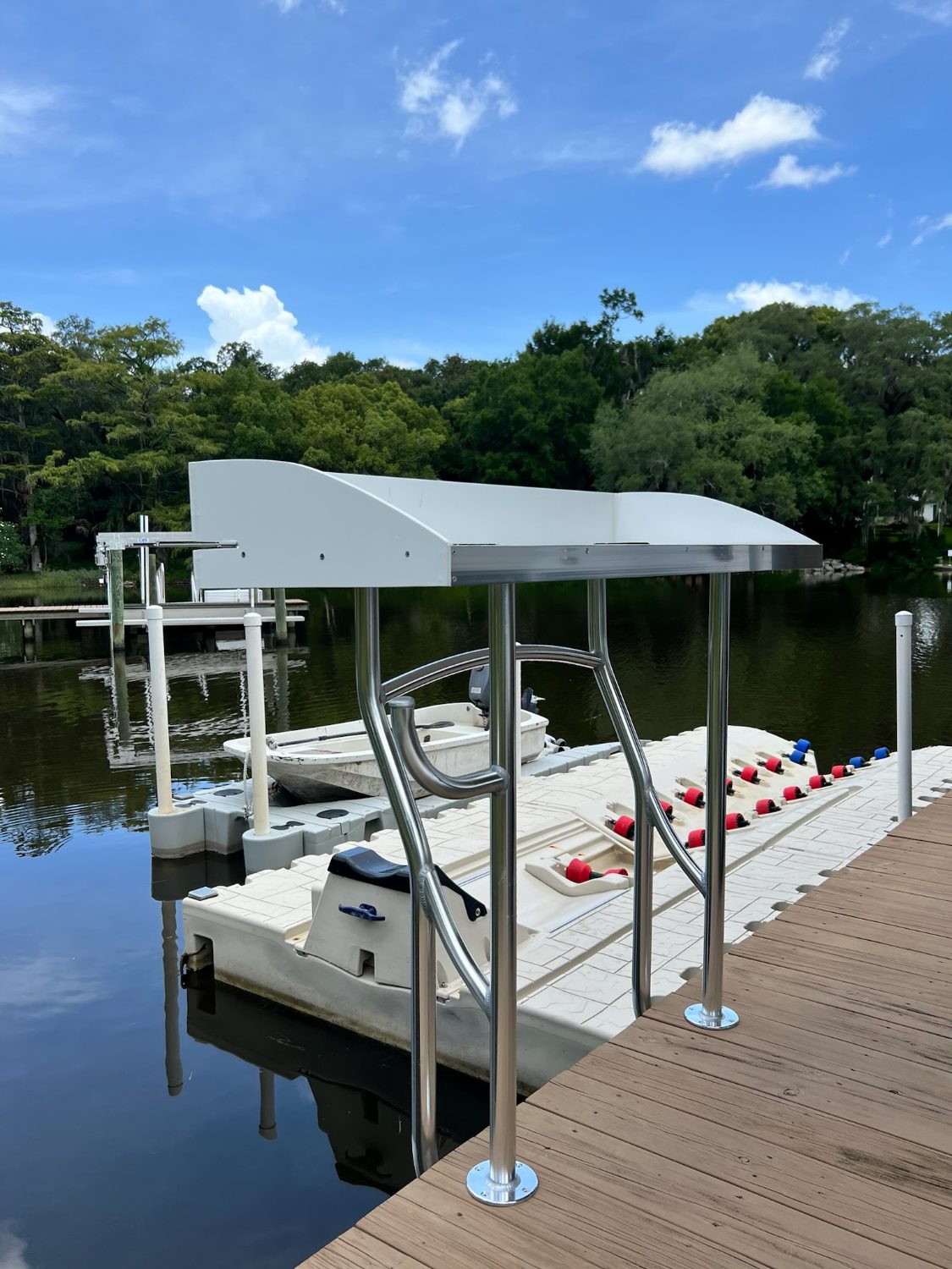 Dockside stainless canopy over a floating dock